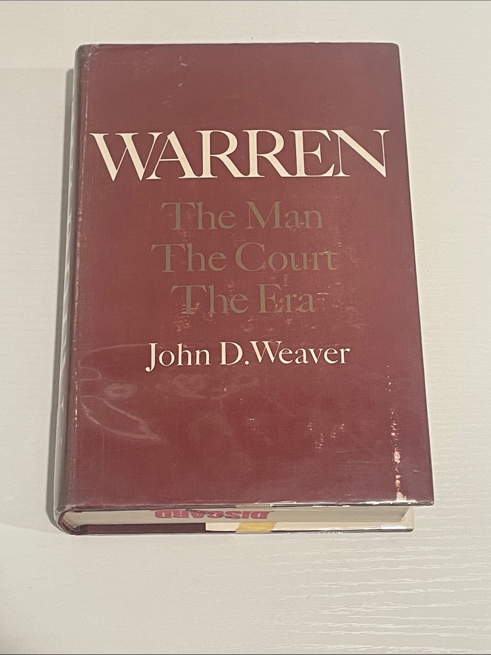 Weavers Maroon Hardcover Book with White Spine Text